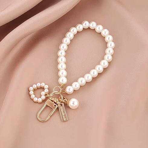 LV PEARL BAG CHARM
